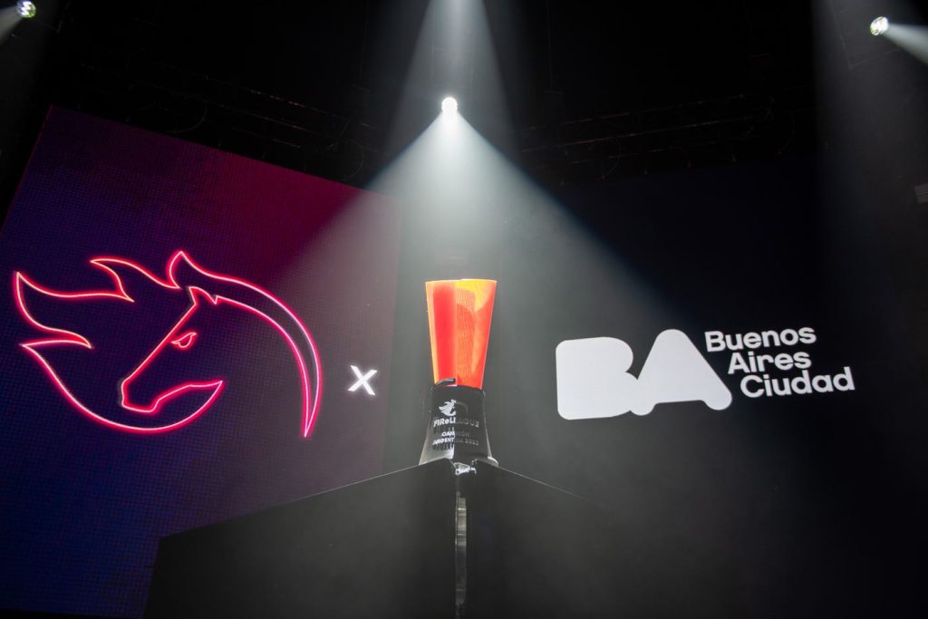 Esports Arenas Fill as Leagues Go Mainstream A packed esports arena with fans facing a giant stage screen